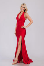 This dress features a fitted silhouette, halter neckline, skirt slit, shiny jersey fabric, and ruching along the bodice. Pair this dress with exciting earrings for you next prom or formal event look.&nbsp;

ACE 3040