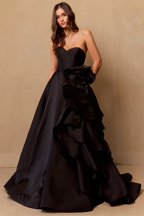 This ballgown features a strapless sweetheart neckline with an A-line silhouette. This gown has a dramatic architectural rosette along the hip that cascades down the skirt. This had red carpet vibes for your next prom or formal event.

ACE SU085