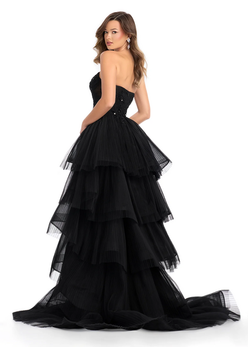 This tiered tulle gown features a sweetheart strapless neckline. The bustier is adorned with floral details that trickle down the skirt. This dress is dramatic and unique and could be ideal for your next pageant, prom or formal event.

Ashley Lauren 11845