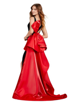 This v-neckline velvet gown features an inverted oversized satin bow with an open back, a sweep train with a slit in the skirt of the fitted silhouette. Stun away at your next prom, pageant or formal event in this unique dress!

Ashley Lauren 11527