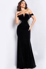 This showstopping Jovani gown features a fit and flare silhouette, off the shoulder neckline, velvet fabric, and intricate beaded detailing on the side of the waist. Pair this dress with statement earrings for the perfect pageant or black tie look.&nbsp;

Jovani 36733A