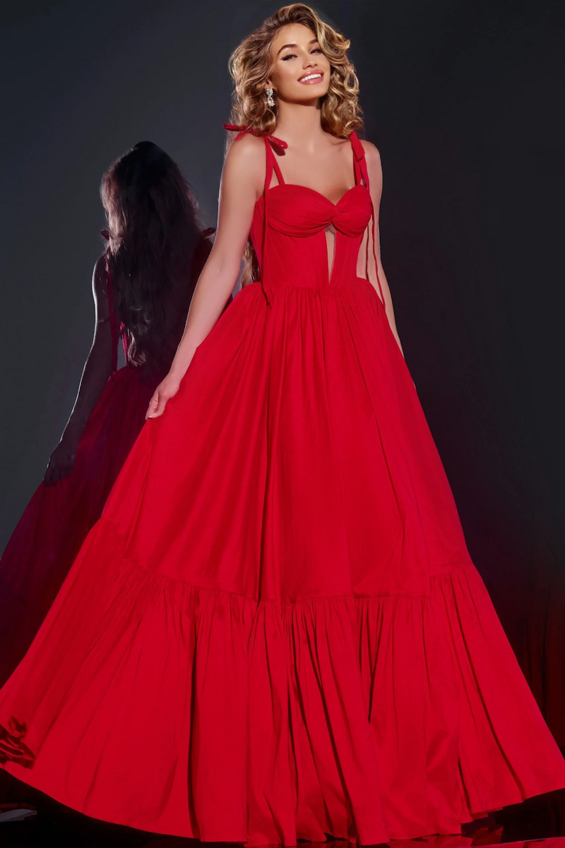 This gown features a sweetheart neckline with straps that have a bow tie at the shoulder, a corset bodice with an illusion cut out. The A-line silhouette creates a feminine look and could be perfect for your next prom or formal event!

Jovani 44182A