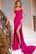 This dress features a strapless neckline with illusion side cut-outs, a fitted silhouette and a slit in the skirt. The glitter stretch fabric creates a unique design element and could be just the vibe for your next prom or pageant!

Jovani 44427A