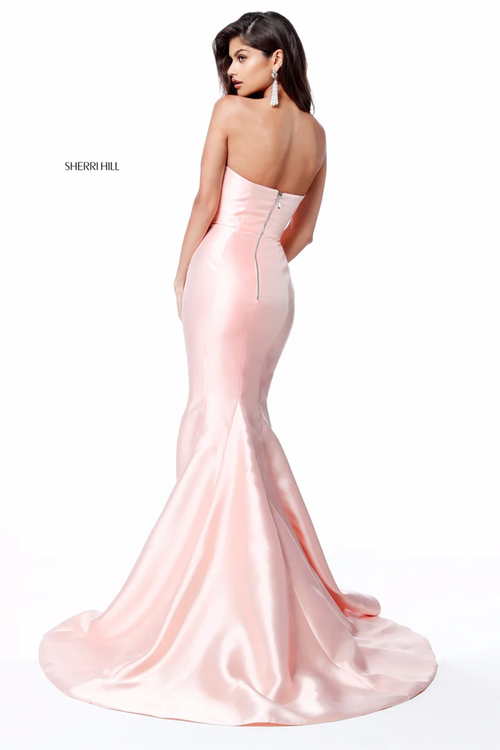 This Sherri Hill gown features a strapless neckline, mikado fabric and a mermaid silhouette with a slit skirt and train. This dress is a forever classic and will never go out of style. Choose this beauty for your next prom or formal event!

Sherri Hill 51671