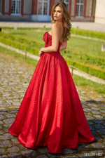 This Sherri Hill gown features a strapless ballgown silhouette, sweetheart neckline with a bow on the bodice, corset, and hot pressed stoning along the dress. Pair this dress with statement earrings for a classy prom or pageant look.&nbsp;

Sherri Hill 56900