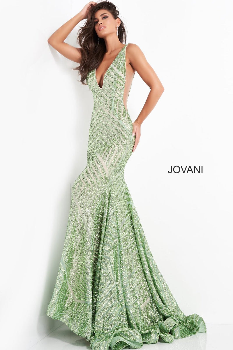 This stunning gown features a deep V-neckline, mermaid silhouette, and sheer fabric with intricate sequin throughout the dress. Add a pair of dainty heels for the perfect prom or pageant look.&nbsp;

Jovani 59762A