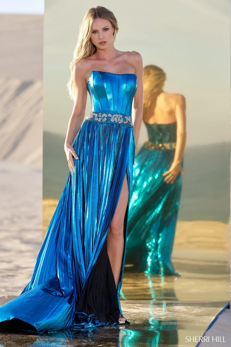 This dress features a metallic fabric with a strapless neckline with a beaded waistband and a pleated skirt with a slit. This dress is eye-catching and could be perfect for your next pageant or prom.

Sherri Hill 56522