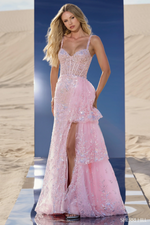 This dress features a sweetheart neckline with straps and a sheer bodice with corset boning and lace applique. The side ruffle overskirt creates a unique design and the sequins throughout offer that glam element. This dress is a playful choice for your next prom or formal event.&nbsp;

Sherri Hill 56589