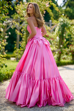 This dress features a strapless neckline with a drop-waist bodice with corset boning. Bow details with beaded embellishments are along the waistline all in a taffeta fabric. This dress is feminine and unique and could be ideal for your next prom or formal event.

Sherri Hill 56958