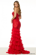 This dress features a strapless neckline with corset boning in the lace bodice. The fitted silhouette has a chiffon ruffle side skirt creating a hint of a mermaid silhouette. This dress is unique and could be perfect for your next prom or formal event.

Sherri Hill 56944