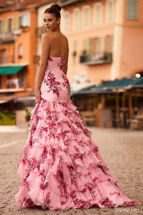 This dress features a strapless neckline with a floral taffeta fabric, a chiffon ruffle skirt creating a mermaid silhouette. This is a unique choice for your next prom or formal event.

Sherri Hill 57144