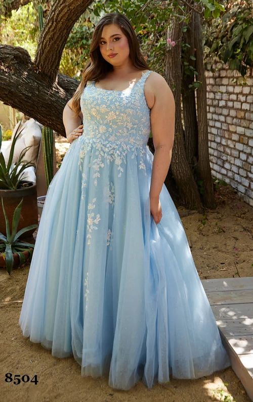 This dress features a square neckline with 1-inch straps and a lace-up back. The bodice is embellished with sequins laid in a floral pattern which trickle down the tulle skirt. This dress is romantic and could be perfect for your next prom or formal event.

LU 8504