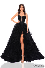 This breathtaking gown showcases glittery tulle and a basque waistline. The tulle skirt is enhanced by delicate gathers, creating an A-line silhouette with a slit. The corset bodice features spaghetti straps, and a sweetheart neckline with a subtle dip, perfectly accentuating your curves. This dress is an enchanting choice for your next prom, pageant or formal event.  AUA 88785