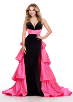 This stunning velvet gown features an illusion v-neckline gown, a tiered ruffled heavy satin overskirt and belt. The fitted silhouette with the flowy overskirt creates a unique shape and dimension and could be perfect for your next pageant, prom or formal event.  Ashley Lauren 11643