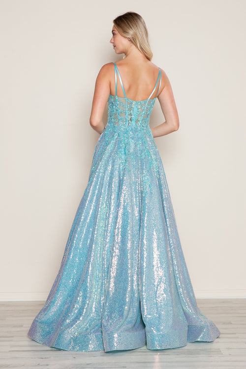 This dress features a straight across neckline with spaghetti straps, a sheer bodice with lace applique and an A-line silhouette with a sequin skirt and pockets. This dress is unique and glamorous and could be perfect for your next prom or formal event.

PY 9554