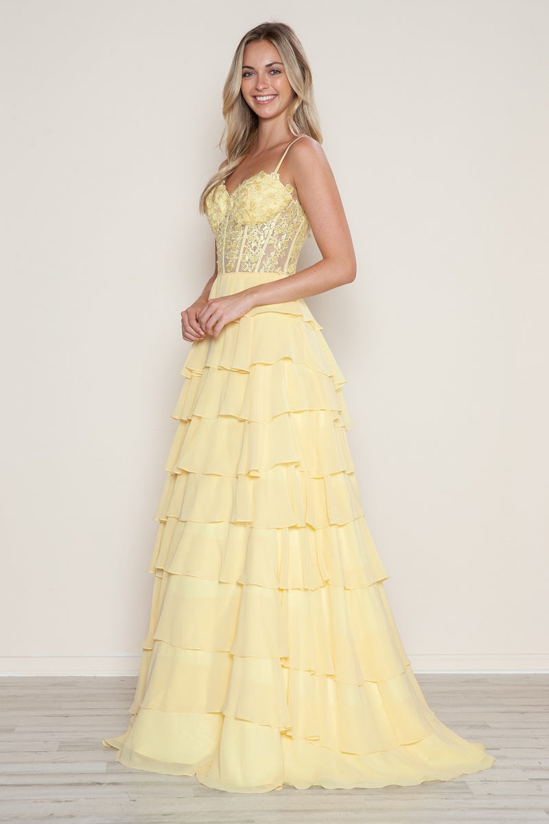 This dress features chiffon fabric with a lace embroidered bodice and corset boning, and a lace-up back. The silhouette is A-line with a ruffle-tiered skirt. This dress can be styled to make it your own at your next prom or formal event!

PY 9698