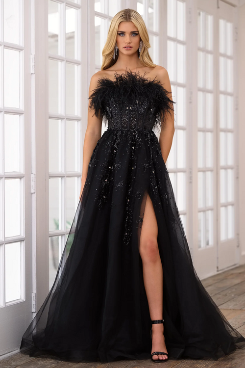 This strapless gown features a sheer corset bodice with feather trim detail on the neckline. The bodice and skirt are adorned with sequins and beads and the A-line skirt features a slit. This dress is unique and high-fashion and could be a perfect choice for your next prom, pageant, or formal event.&nbsp;  ARY 39232