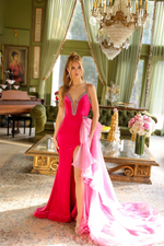 This velvet gown features a beaded neckline and a fitted silhouette with a side ruffle train. The plunge neckline has colored jewels following through the spaghetti straps. A gorgeous choice for your next pageant or formal event.  ARY 39556