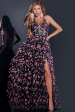 This gown features a halter sweetheart neckline with a jeweled embellished bodice, an A-line silhouette with a ruffle-tiered skirt and a slit all in a floral print. This dress is unique and a playful choice for your next prom or formal event.

Jovani D5085A