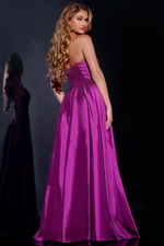 This dress features a strapless neckline with an A-line silhouette and a skirt slit. This gown is simple and could be styled to make it your own at your next prom or formal event.

Jovani D5822A