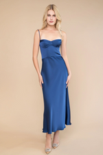 This mid-length cocktail dress features a sweetheart neckline with spaghetti straps and a soft-flared skirt. This dress is simple and modern and could be styled to make it your own at your next homecoming or sweethearts dance!

KTM GWCV0664