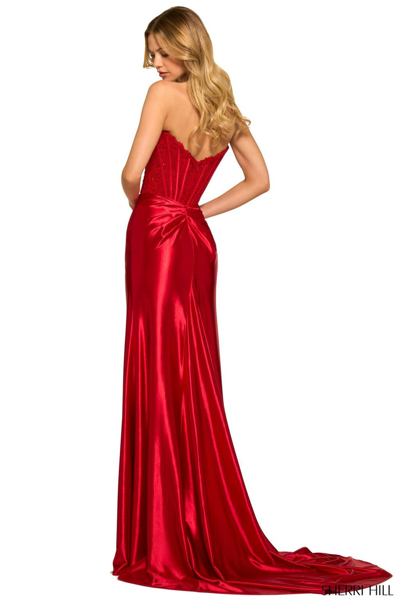Valea is a fun strapless dress with a corset lace bodice and a high slit. Pair this unique gown with simple accessories to complete your prom or pageant look.  Sherri Hill&nbsp;55419