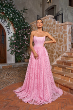 This dress features a strapless boat neckline with a lace-up back and an A-line silhouette. The fabric is a floral lace and has a boho vibe. This dress can be styled to make it your own at your next prom or formal event.

JAD J26029