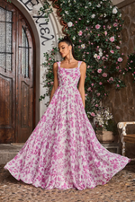 This dress features a square neckline with 1-inch straps, a lace-up back, an A-line silhouette with pockets. The floral print is vibrant and has a bold design impact. It may be the perfect gown for your next prom or formal event!

JAD J26043