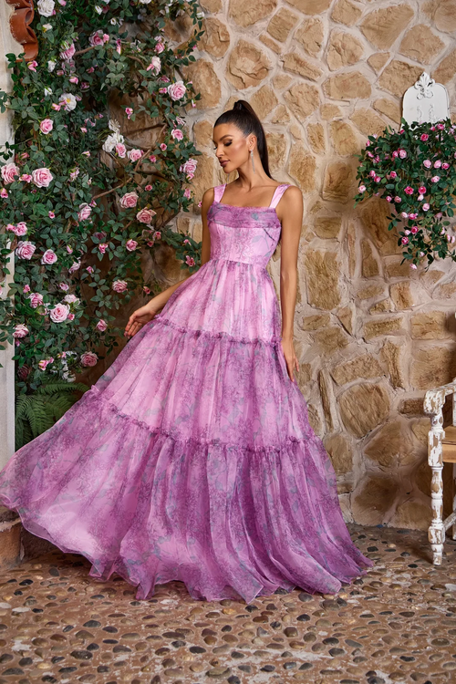 This gown features a square neckline with 1-inch straps and a lace-up back. The A-line silhouette is complimented with a subtle floral print. This dress is unique and could be ideal for your next prom or formal event.

JAD J26041