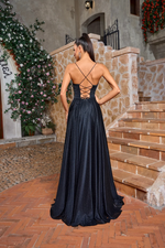 This dress features a boat neckline, spaghetti straps with an open lace-up back. The A-line silhouette with a slit allows for beautiful movement, perfect for your next prom or formal event.&nbsp;

JAD J26014