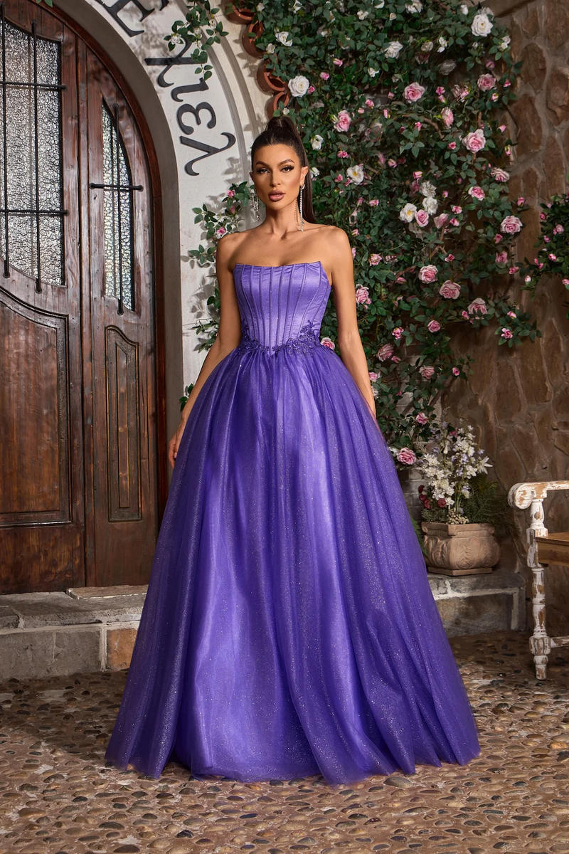 This gown features a strapless neckline with a lace-up back, a bodice with corset boning and a glitter tulle skirt A-line skirt. This fairytale dress may be ideal for your next prom or formal event.&nbsp;

JAD J26008