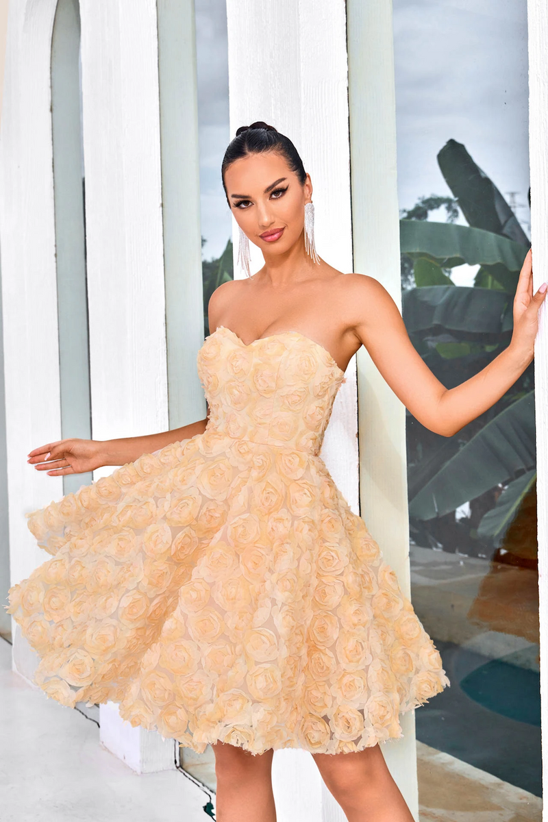 This dress features a strapless sweetheart neckline with an A-line silhouette and 3D florals that provide a unique texture and romantic aesthetic. This dress could be ideal for your next homecoming or sweethearts dance.&nbsp;  JAD J24083