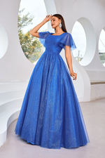 This modest dress features a square neckline with butterfly sleeves, an A-line silhouette with a covered back, and glitter tulle fabric. This dress may be perfect for your next prom or formal event.

JAD J25002